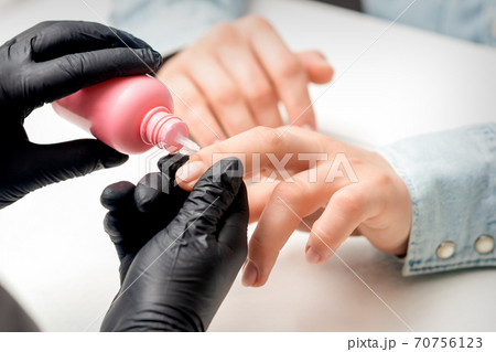 Nail treatment by cuticle oil 70756123