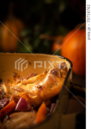 Baked chicken with vegetables Baked chicken with vegetables 70758762