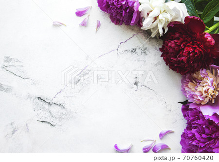 Peony flowers on a marble background 70760420