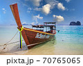 Longtail boat on beach in Thailand with blue sky 70765065