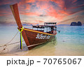 Amazing sunset over longtail boat on beach in Thailand 70765067