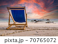 Amazing sunset watched from deck chair at white beach in Ko Lipe, Thailand 70765072