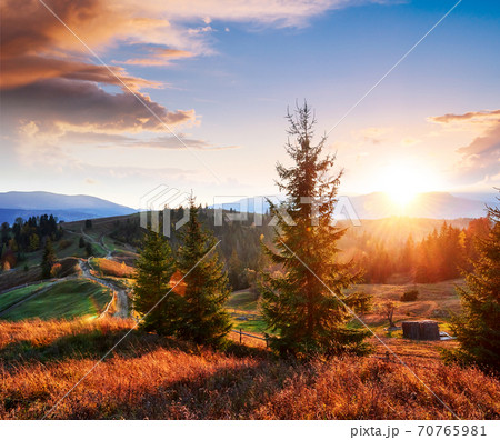 Fantastic morning countryside landscape. Colorful sky. Carpathian, Ukraine, Europe. Beauty world Fantastic morning countryside landscape. Colorful sky. Carpathian, Ukraine, Europe. Beauty world 70765981