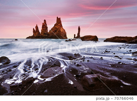 Iceland, Jokulsarlon lagoon, Beautiful cold landscape picture of icelandic glacier lagoon bay, The Rock Troll Toes. Reynisdrangar cliffs. 70766046