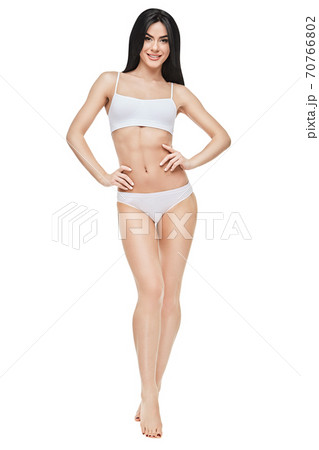 Fitness young woman with a beautiful body on white background 70766802
