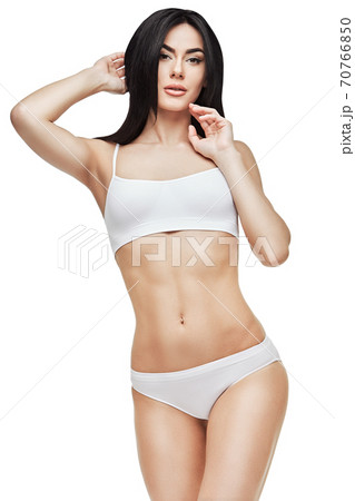 Fitness young woman with a beautiful body Fitness young woman with a beautiful body 70766850