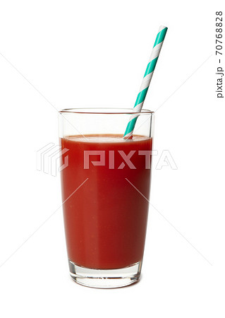 Glass of tomato juice isolated on white background Glass of tomato juice isolated on white background 70768828