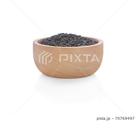 Heap of dry poppy seeds isolated on white. 70769497