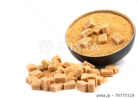 Brown sugar in a wooden bowl or wooden spoon Sugar for health Use for cooking or desserts on white and sugar backgrounds. Brown sugar in a wooden bowl or wooden spoon Sugar for health Use for cooking or desserts on white and sugar backgrounds. 70775526