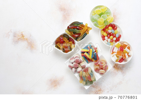 Colorful candies, jelly and marmalade,unhealthy sweets. Colorful candies, jelly and marmalade,unhealthy sweets. 70776801