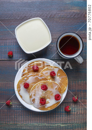 Delicious pancakes with condensed milk. 70776802