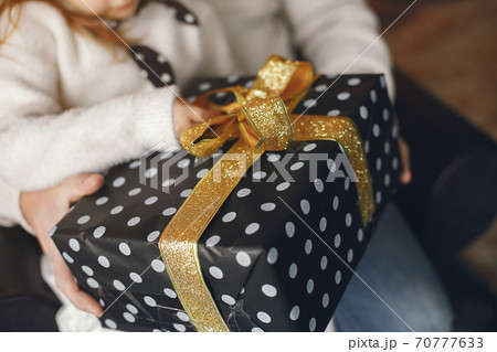 Family at home in a Christmas decorations Family at home in a Christmas decorations 70777633