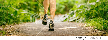 Run city woman running shoes jogging fast panoramic banner active healthy lifestye person training outdoors in summer background. Run city woman running shoes jogging fast panoramic banner active healthy lifestye person training outdoors in summer background. 70783166