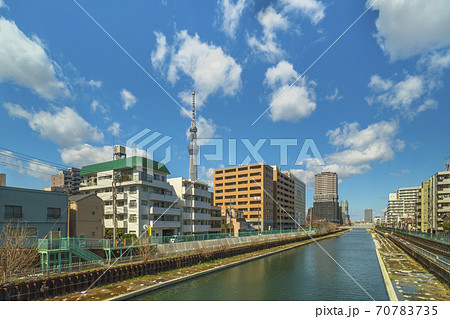 東京 錦糸町 横十間川あるいは天神川と東京スカイツリーの写真素材