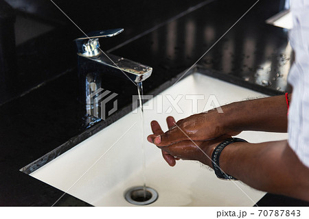 man hands rubbing with soap and water in sinks man hands rubbing with soap and water in sinks 70787843