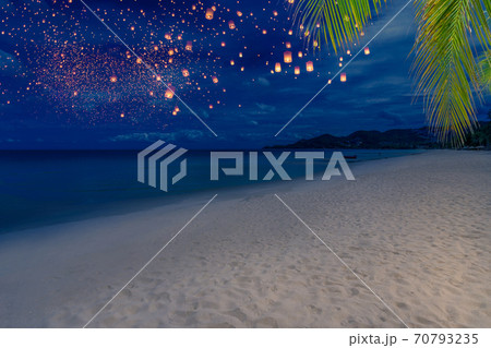 Released Lanterns on beach 70793235