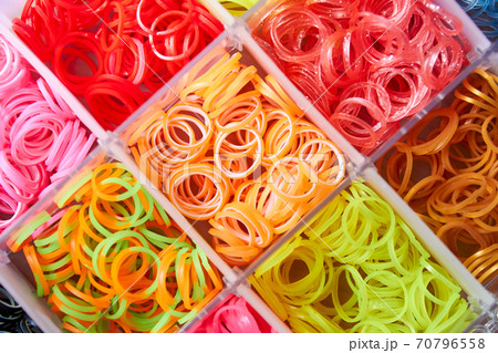 A set of colorful rubber bands and loom knit for knitting wristbands. Close-up, selective focus 70796558