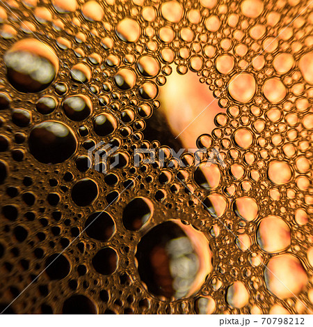 Orange water droplets background with yellow background Orange water droplets background with yellow background 70798212