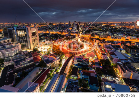 Cityscape of Victory Monument with car traffic on roundabout road in the morning at Bangkok Cityscape of Victory Monument with car traffic on roundabout road in the morning at Bangkok 70800758