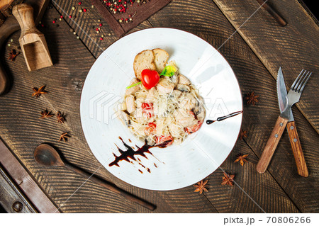 Top view on chicken tagliatelle with mushrooms Top view on chicken tagliatelle with mushrooms 70806266