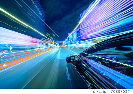 View from Side of Car moving in a night city 70807034