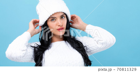 Young woman in a cold weather winter outfit Young woman in a cold weather winter outfit 70811329