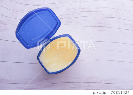 top view of petroleum jelly in container on table  70811424