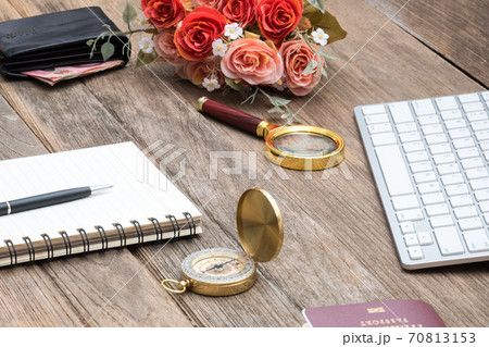 Money bag with compass and computer keyboard 70813153
