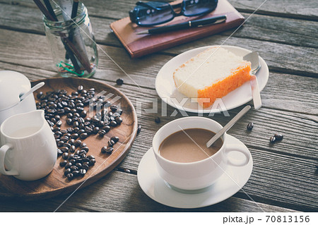 Vintage Film Look: cup of coffee with cake 70813156