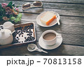 Vintage Film Look: cup of coffee with cake 70813158