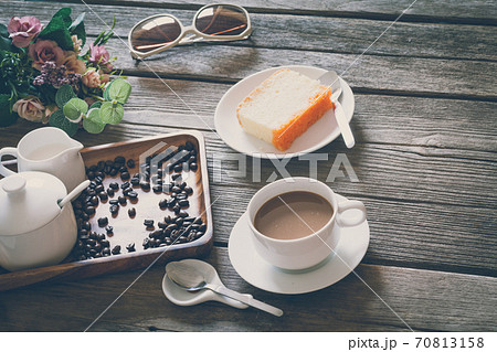 Vintage Film Look: cup of coffee with cake 70813158