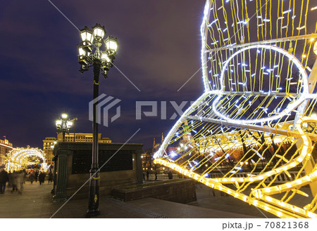 Christmas (New Year holidays) decoration in Moscow (at night), Russia-- Manege Square near the Kremlin 70821368
