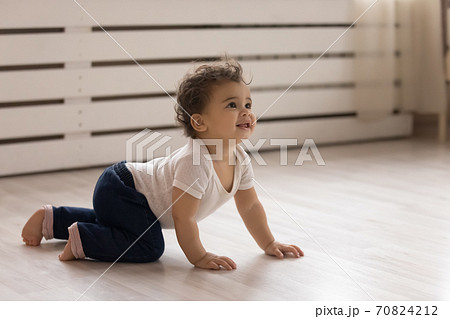 Small biracial baby infant crawl at home 70824212