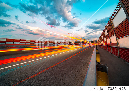 Light trail vehicles at highway 70824998