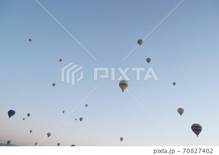 Hot air balloons flight in the sky. 70827402