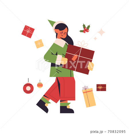 green elf girl holding gift box female cartoon character santa helper happy new year merry christmas green elf girl holding gift box female cartoon character santa helper happy new year merry christmas 70832095