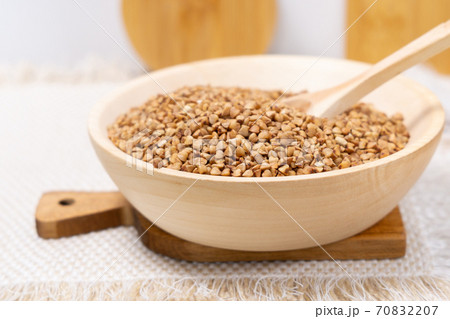 Buckwheat grain dry buckwheat. Close-up of brown buckwheat groats. Healthy food. 70832207