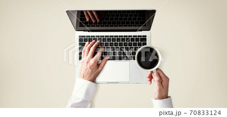 Businessman using a laptop computer Businessman using a laptop computer 70833124
