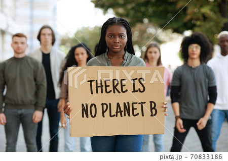 There is no planet B placard in african woman hands There is no planet B placard in african woman hands 70833186