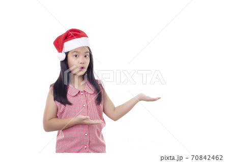 Portrait Little Asian girl wearing Santa hat Portrait Little Asian girl wearing Santa hat 70842462