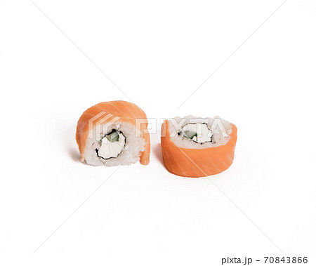Philadelphia roll sushi with salmon cream cheese on a white isolated background. Sushi menu. Philadelphia roll sushi with salmon cream cheese on a white isolated background. Sushi menu. 70843866