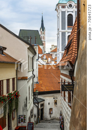 View of a narrow medieval street in Cesky Krumlov in the Czech Republic 70845723
