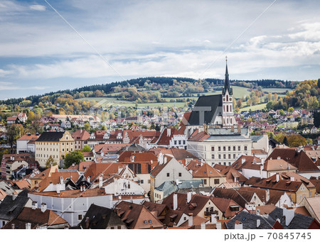 Aerial view of houses and medieval St. Vitus Church in Cesky Krumlov in the Czech Republic Aerial view of houses and medieval St. Vitus Church in Cesky Krumlov in the Czech Republic 70845745