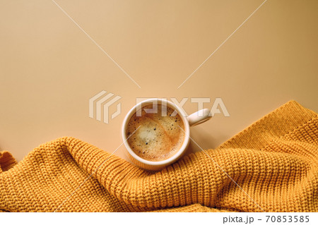 Cup of coffee, yellow sweater. Autumn, fall concept. Cup of coffee, yellow sweater. Autumn, fall concept. 70853585