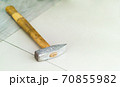hammer on the stone floor 70855982
