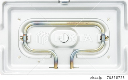 The heating elements on the waffle maker isolated on the white background. The heating elements on the waffle maker isolated on the white background. 70856723