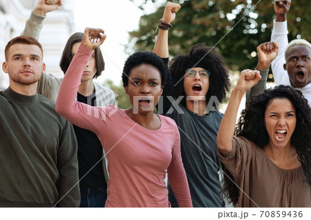 Multiethnic protestors striking against racism on the street Multiethnic protestors striking against racism on the street 70859436