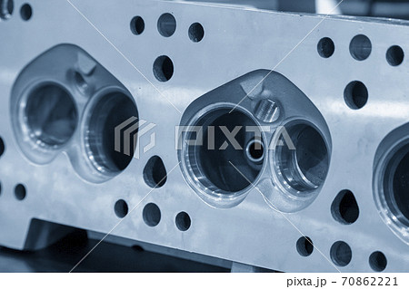 Close-up scene of aluminum cylinder head. Close-up scene of aluminum cylinder head. 70862221