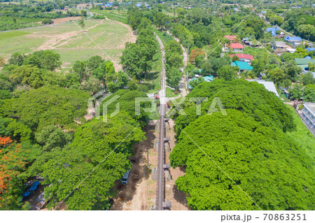 Aerial view of River Kwai Bridge with train rail way with Chao Phraya River, Tha Ma Kham, Mueang Kanchanaburi District, Thailand. 70863251