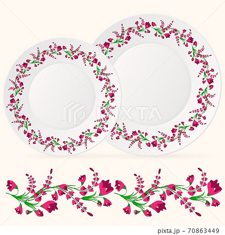 Repeating pattern of red flowers on a white plate. Repeating pattern of red flowers on a white plate. 70863449